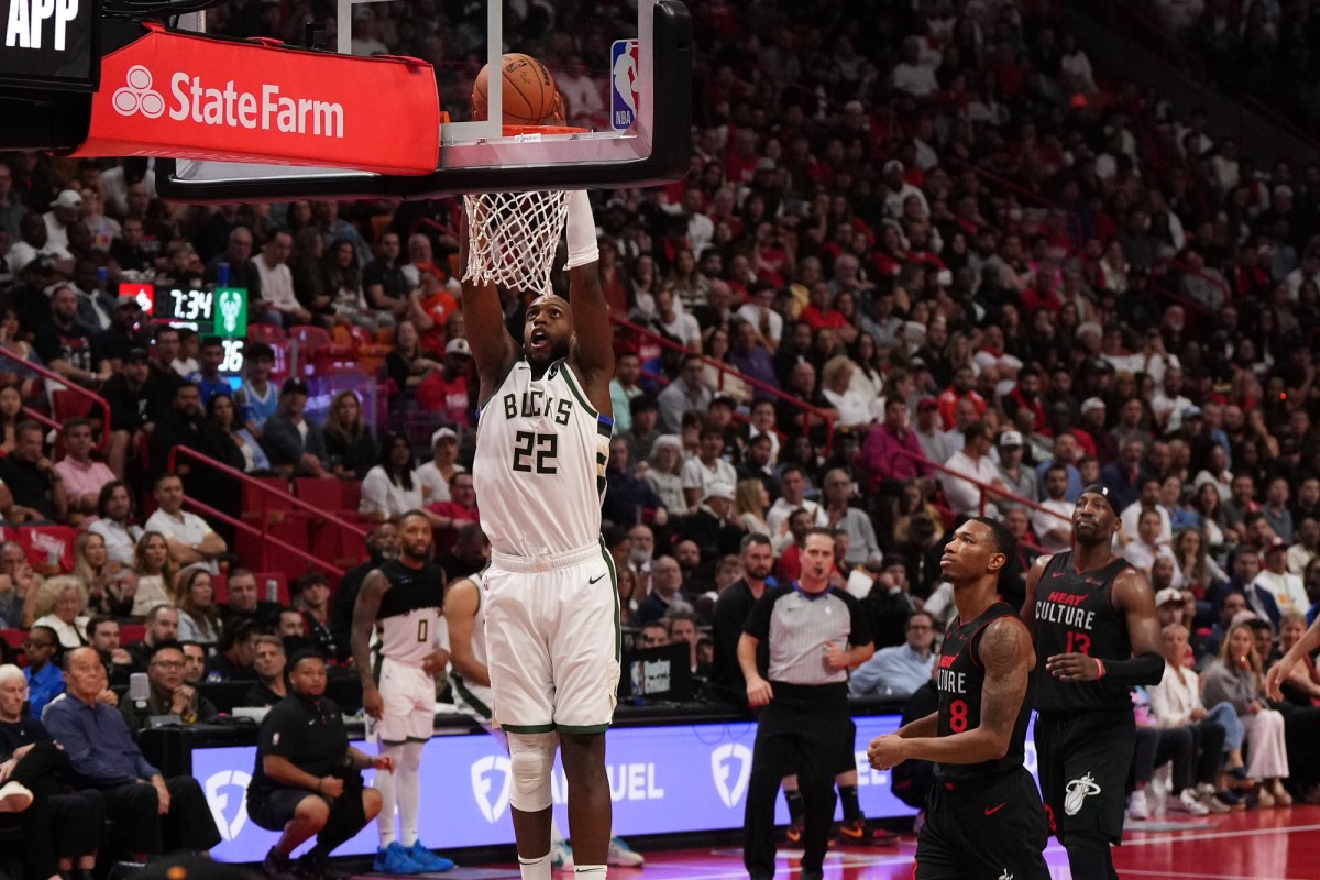 Milwaukee Bucks forward Khris Middleton (22) dunks the ball against the Miami Heat 